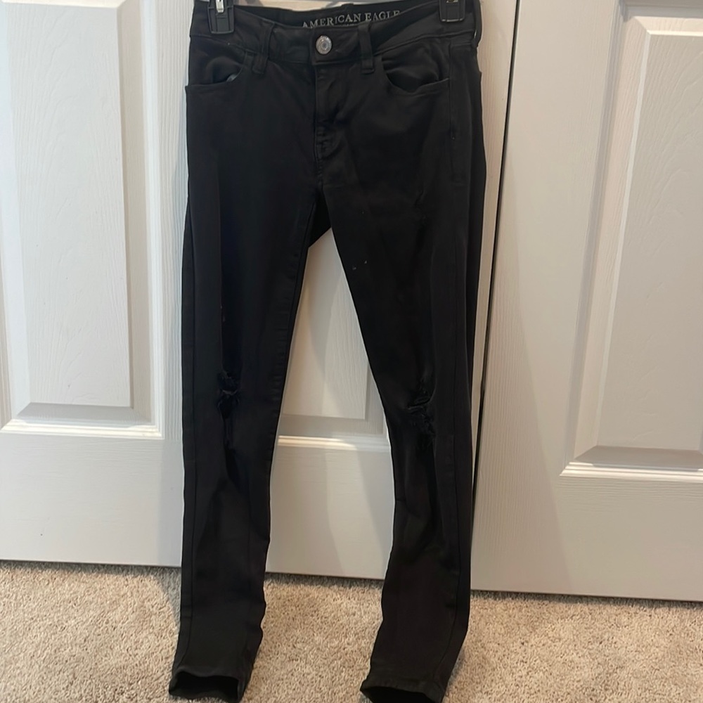 womens black ripped skinny jeans